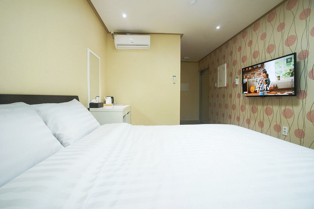 Orange Tree Hotel Чеджудо Экстерьер фото