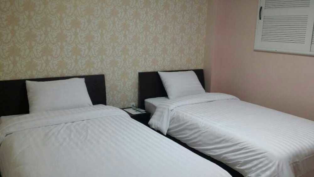 Orange Tree Hotel Чеджудо Экстерьер фото