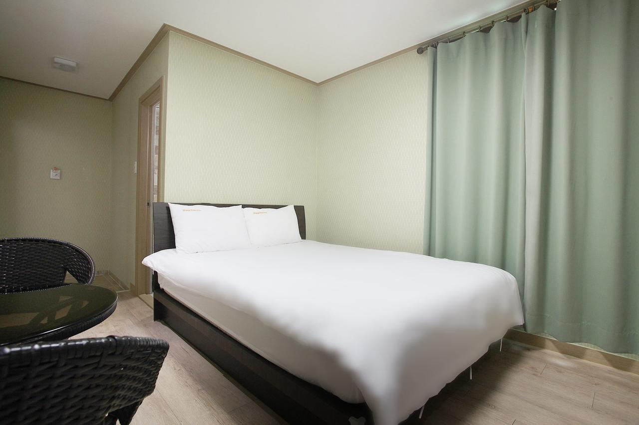 Orange Tree Hotel Чеджудо Экстерьер фото