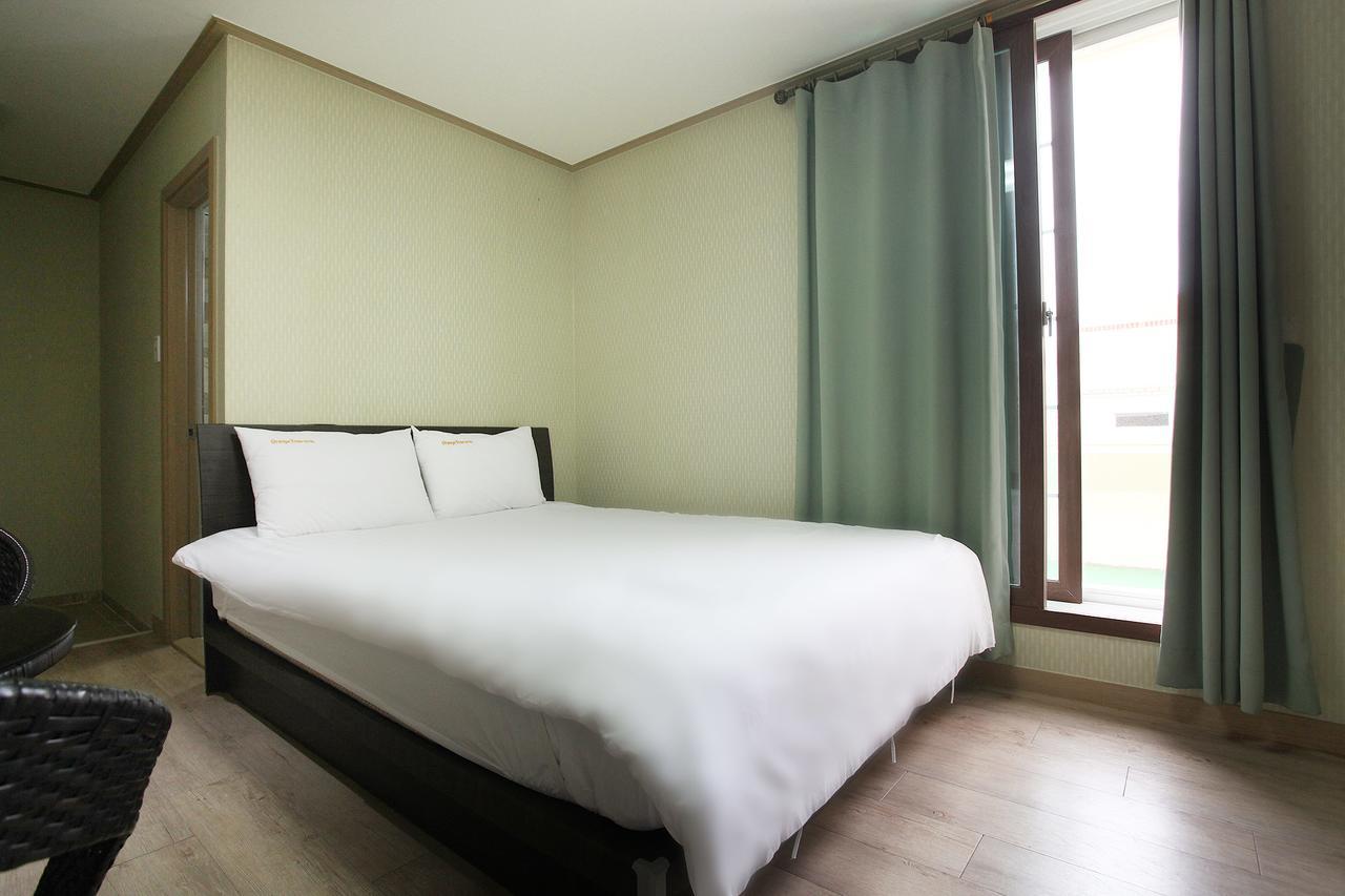 Orange Tree Hotel Чеджудо Экстерьер фото