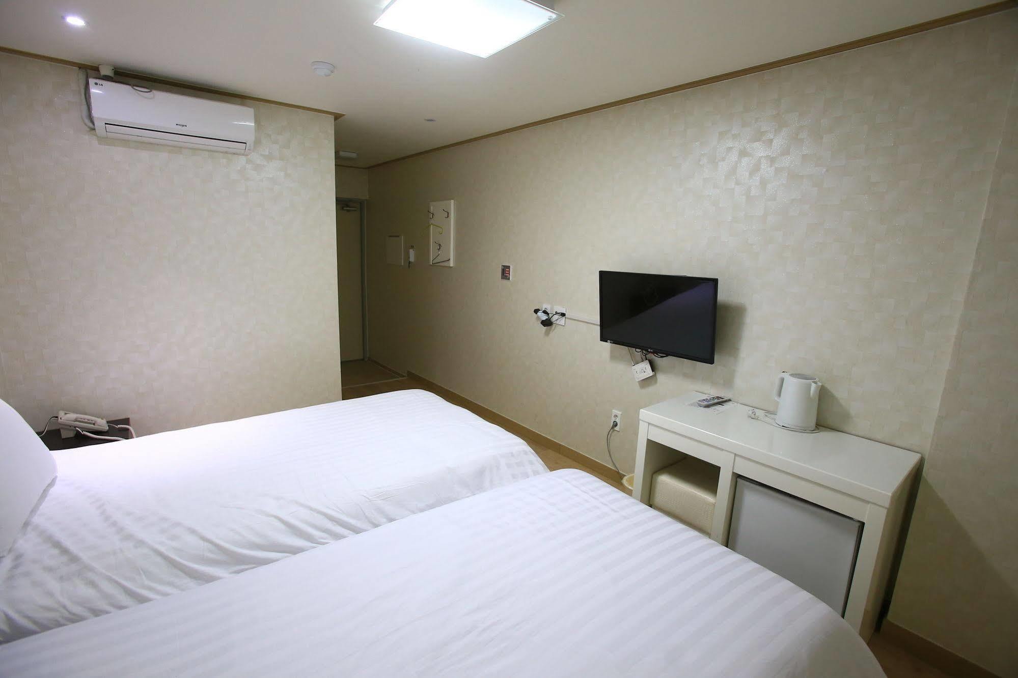 Orange Tree Hotel Чеджудо Экстерьер фото