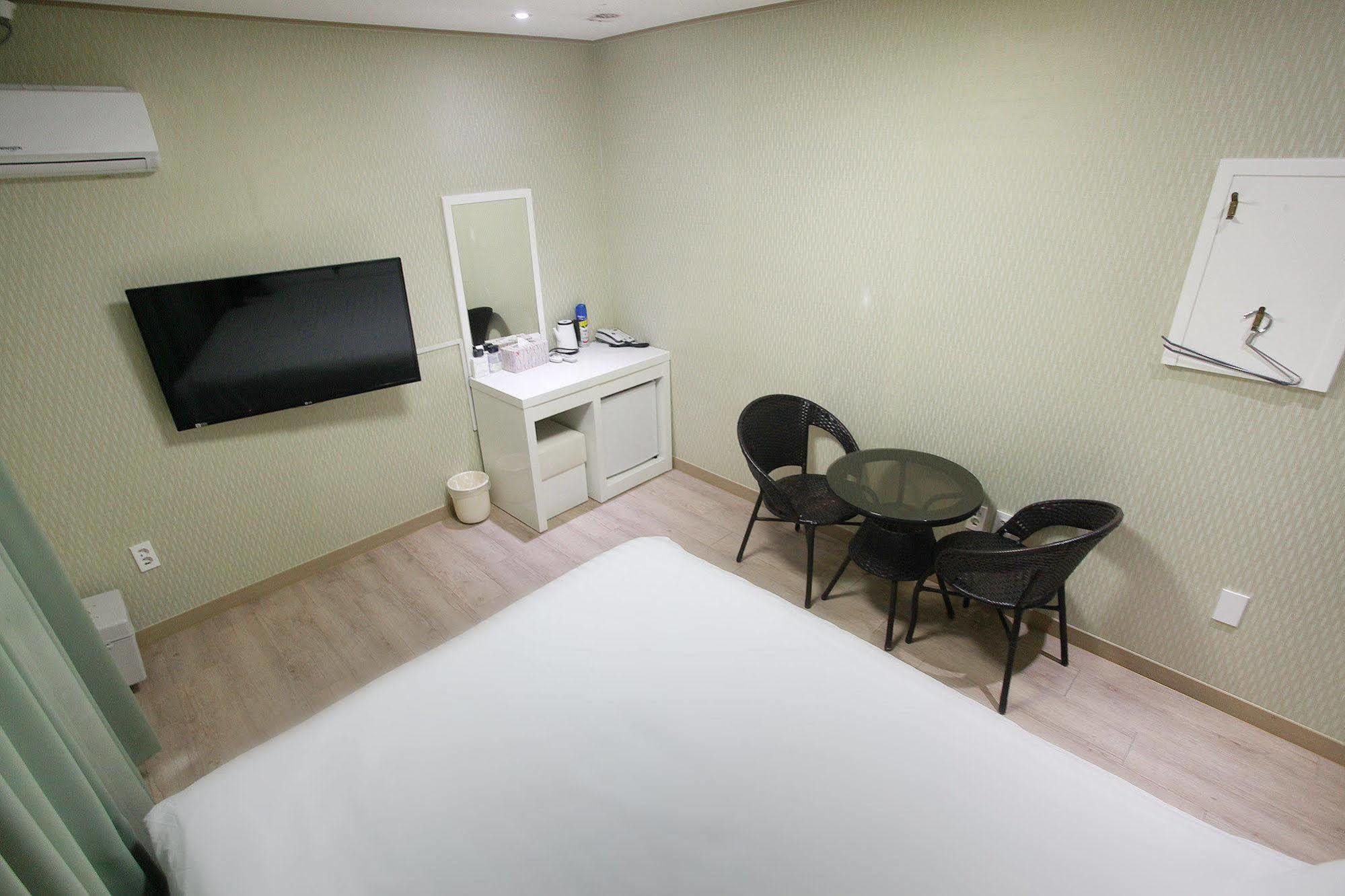 Orange Tree Hotel Чеджудо Экстерьер фото