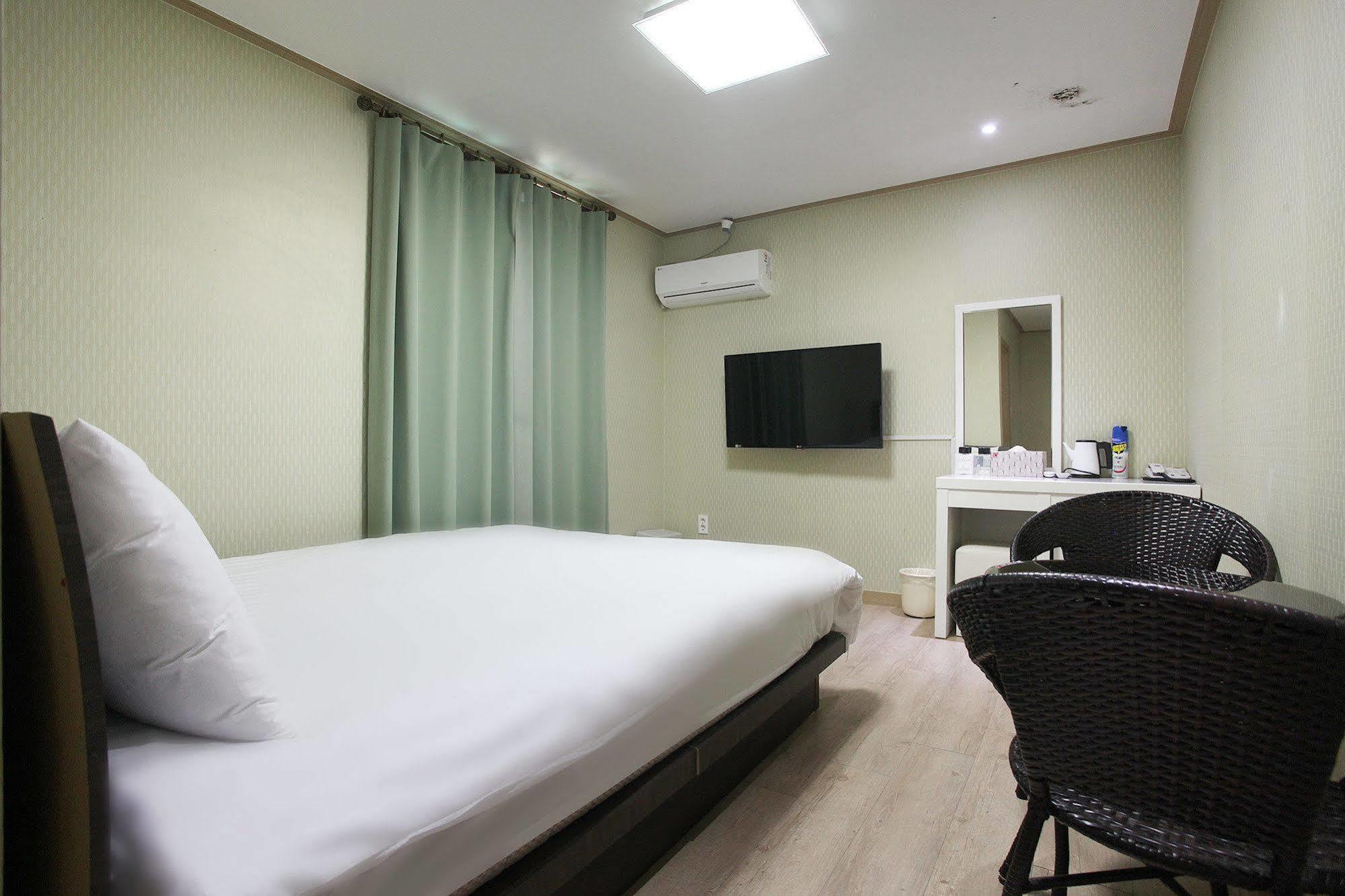 Orange Tree Hotel Чеджудо Экстерьер фото