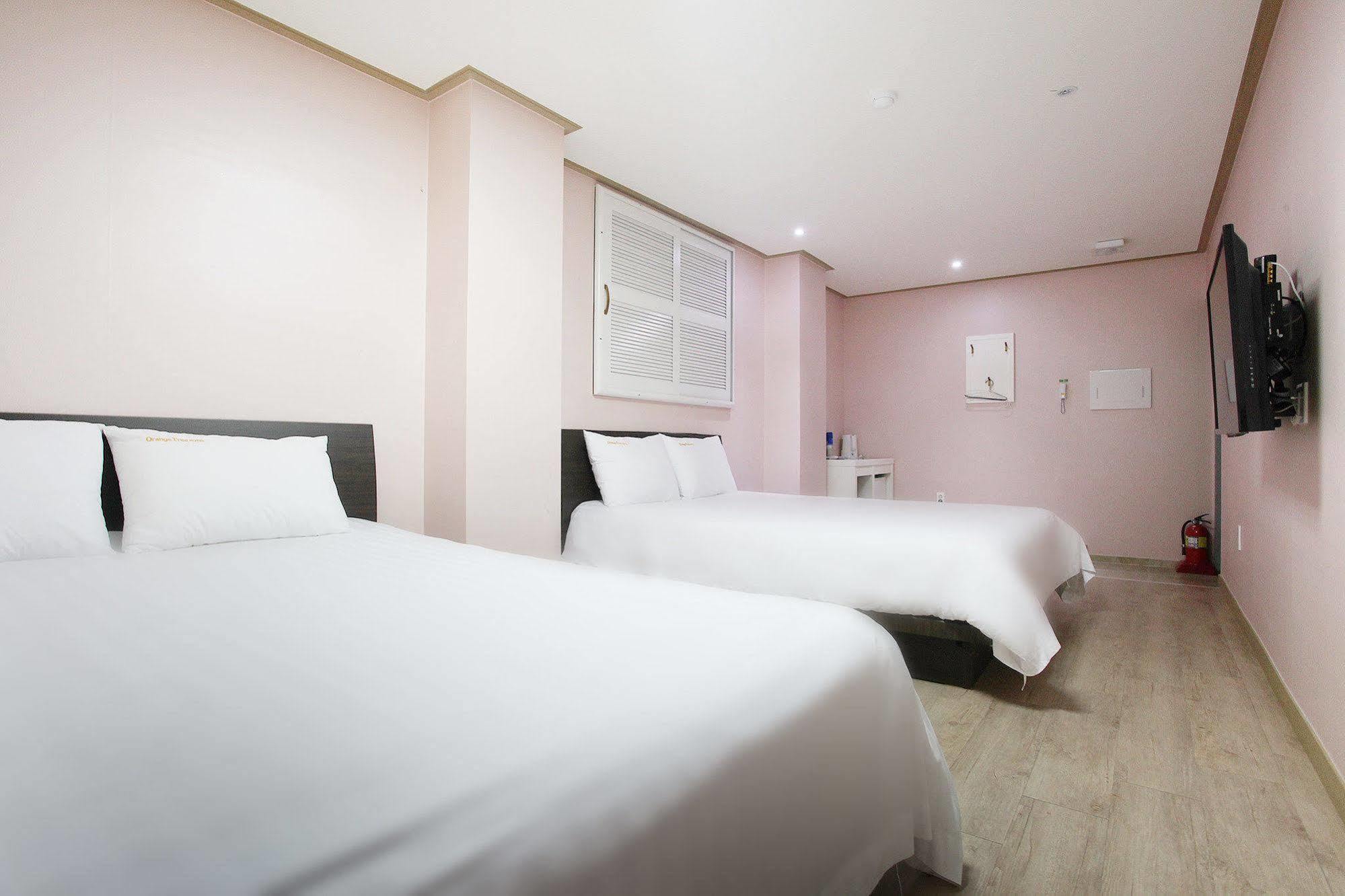 Orange Tree Hotel Чеджудо Экстерьер фото