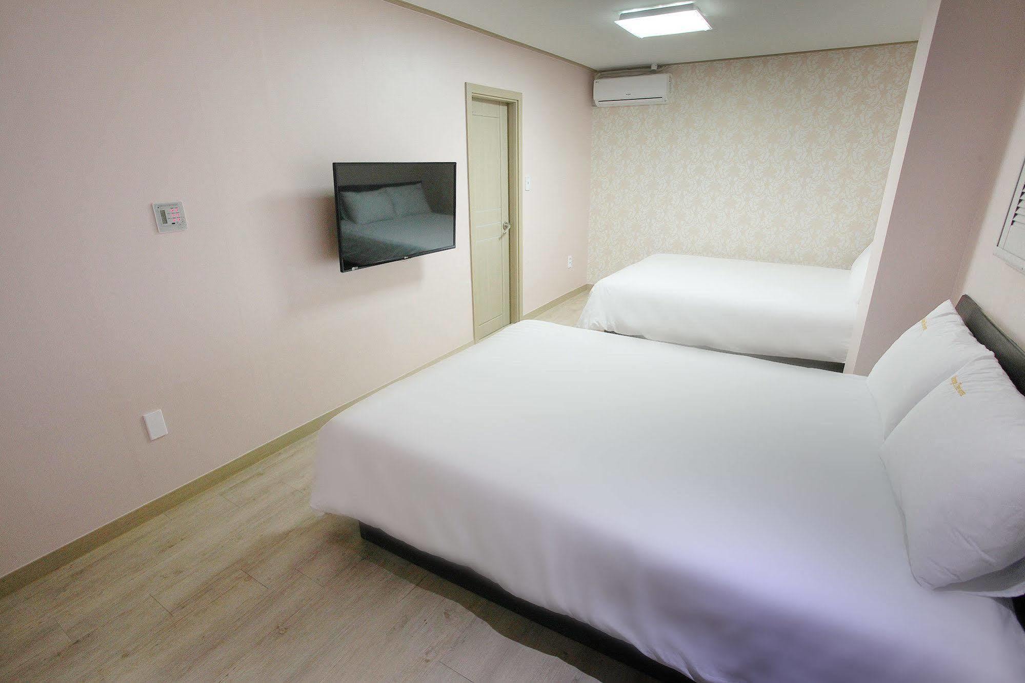 Orange Tree Hotel Чеджудо Экстерьер фото