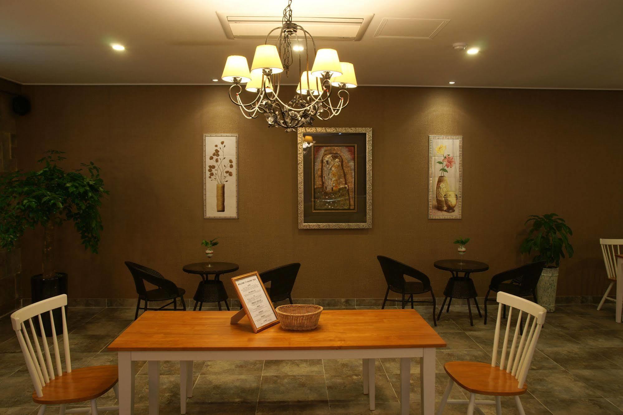 Orange Tree Hotel Чеджудо Экстерьер фото